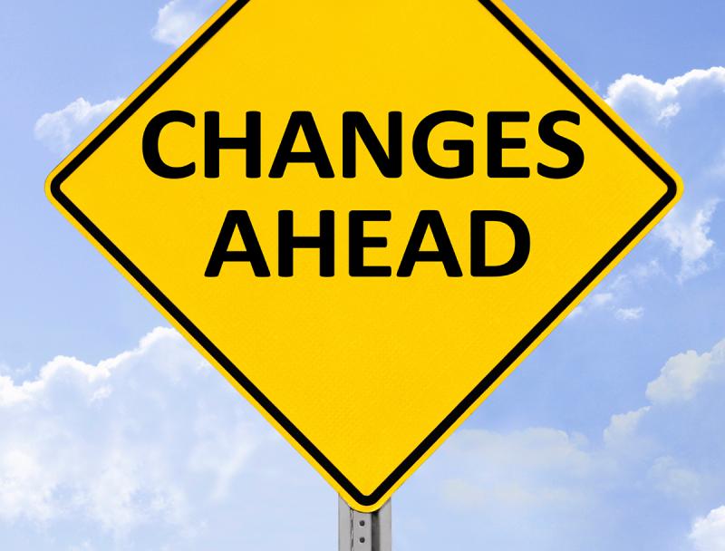 yellow sign that reads 'changes ahead' 