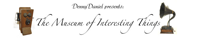Banner for the Museum of Interesting things, two devices on either side of a script 