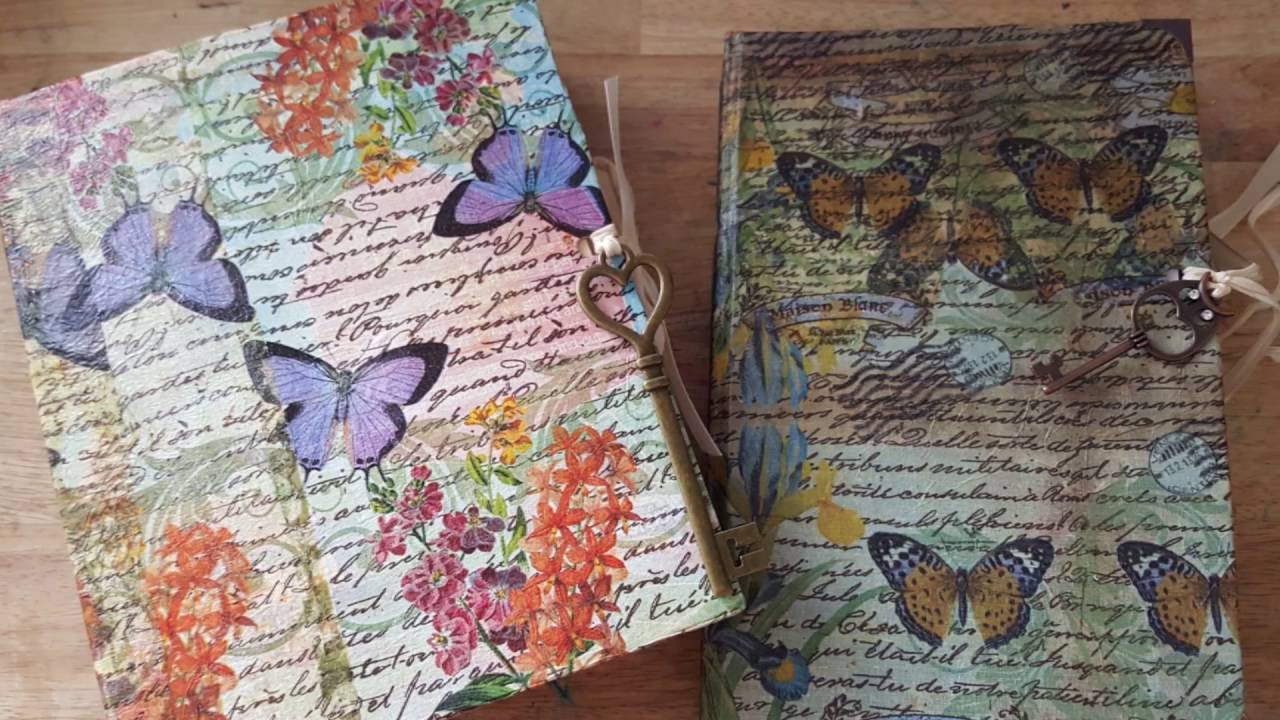 two journals with butterflies on them