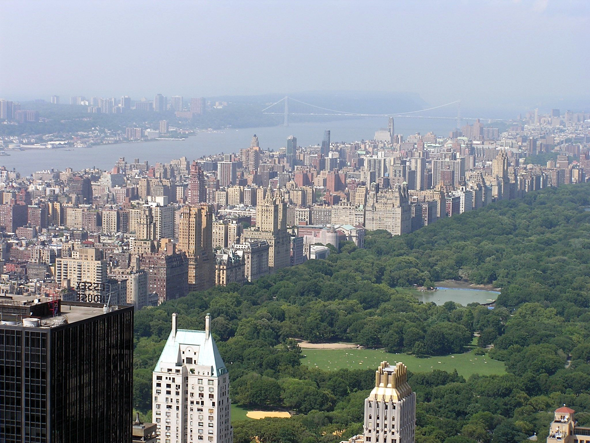color aerial photograph of central park and surrounding skyscrapers on a foggy day