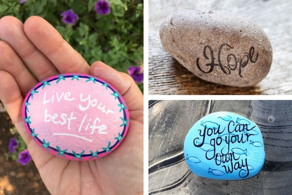 some inspirational rocks with phrases like 'live your best life' on them