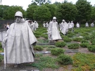 stone soldiers in a field