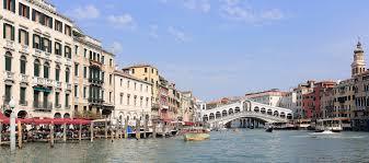 a canal in the middle of Venice