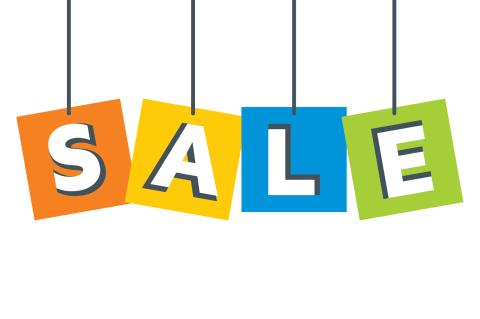 colorful letters hanging from string that spell out the word sale