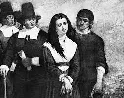 black and white photograph of an oil painting that depicts a girl with her hands bound being led somewhere by a group of men dressed in traditional Puritan clothing