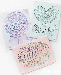 color photo of three colorful lacy greeting cards