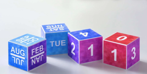 color photo of wood blocks with numbers and months 