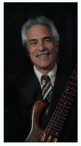 color photo of Barry Wiesenfeld, the band's bassist 