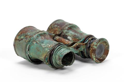 sea tarnished metal binoculars 