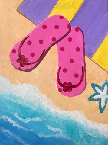 bright pink flip flops on a sandy beach 