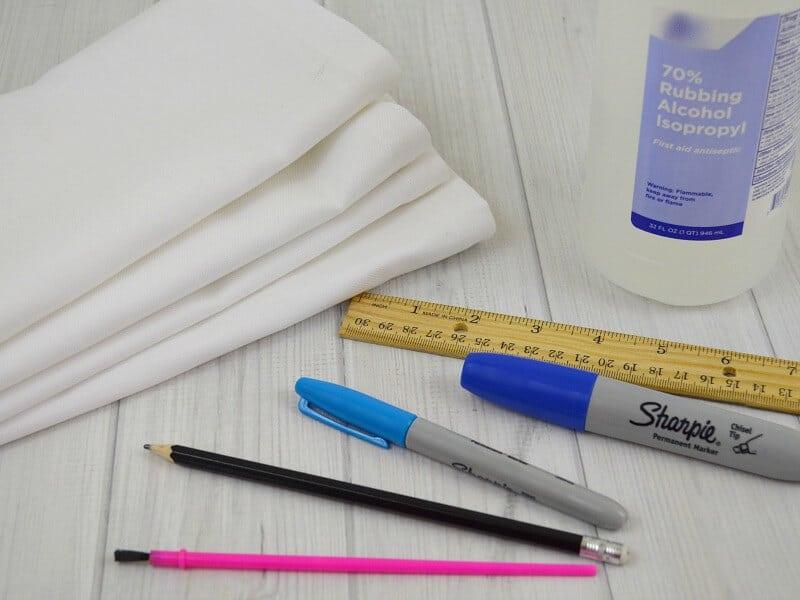 blank white napkins and art supplies for dyeing 