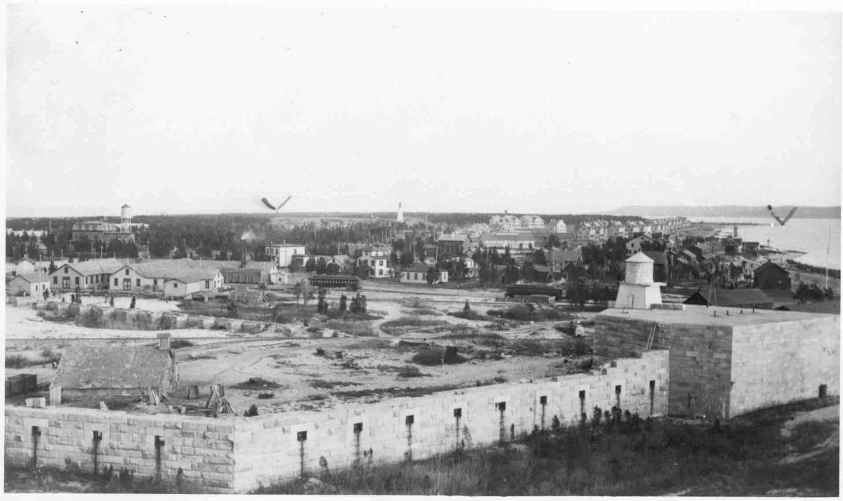 black and white photograph of a fort 