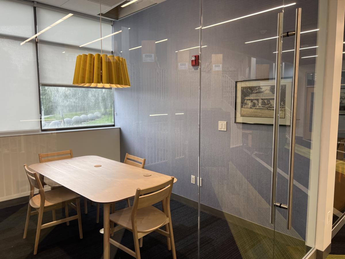 Picture of group study room with black and white photo on the wall 