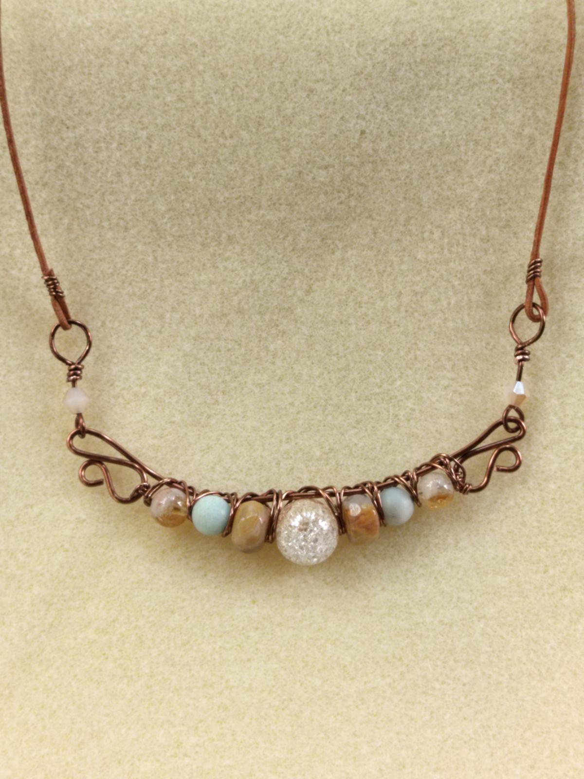 copper necklace with several beads